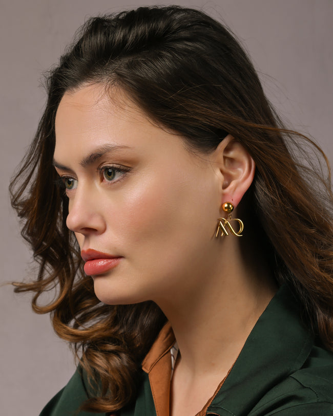 Les boucles d'oreilles Medessey/plaquées or 18 K